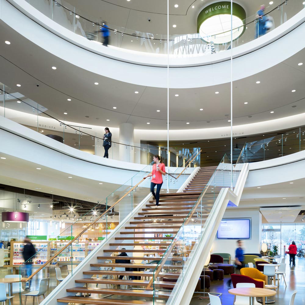 A wide shot of the stairs up to the 2nd floor of Think Healthcare.