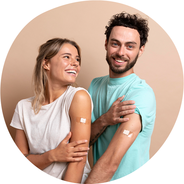couple smiling after receiving flu shots
