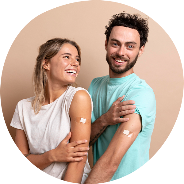 couple smiling after receiving flu shots