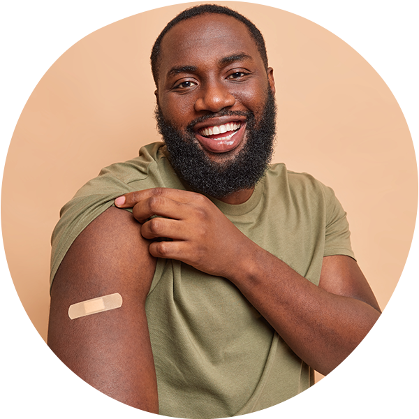 african american man smiling after receiving flu shot