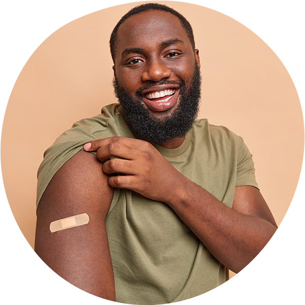 african american man smiling after receiving flu shot