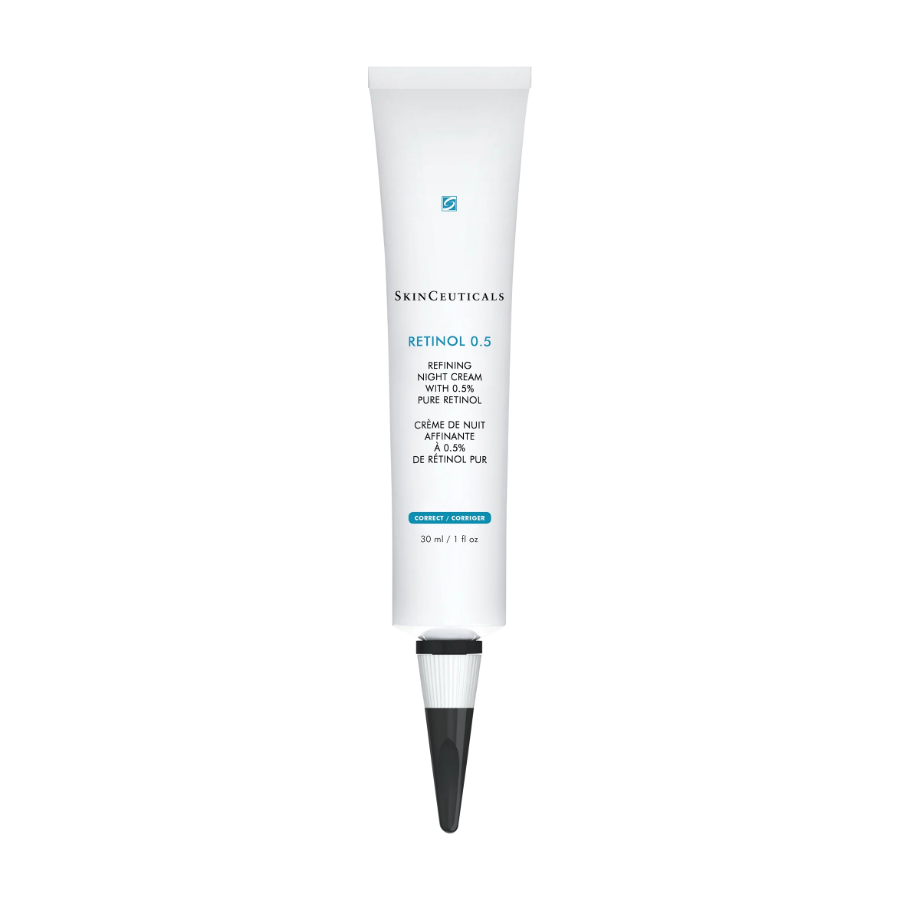 A white tube of SkinCeuticals Retinol 0.5 Refining Night Cream, featuring a black cap and blue accents, standing upright against a plain white background. The tube contains 30 ml (1 fl oz) of product.