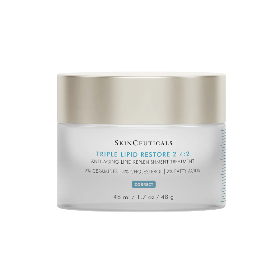 A glass jar of SkinCeuticals Triple Lipid Restore 2:4:2, an anti-aging face cream with a silver lid, containing 48 ml (1.7 oz). The label highlights ceramides, cholesterol, and fatty acids.